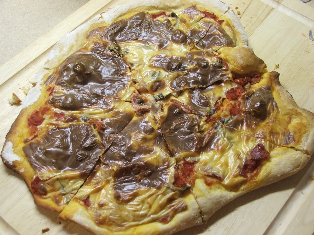 A pizza that is just... disgusting. I don't know how to put words to this one, other than it looks like it's topped with a sheet of plastic. It's vile.